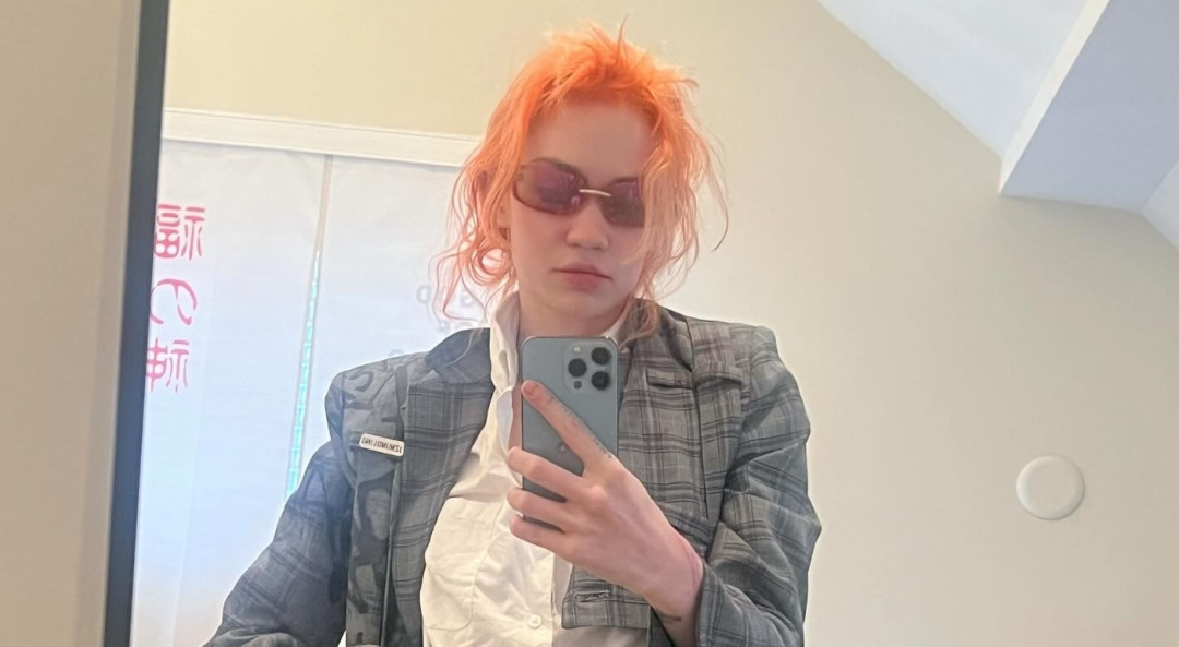 Граймс тату на лице