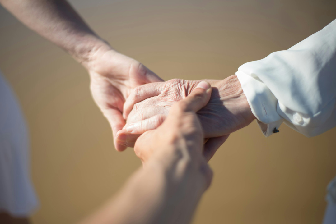 three-hands-holding-each-other-together-image