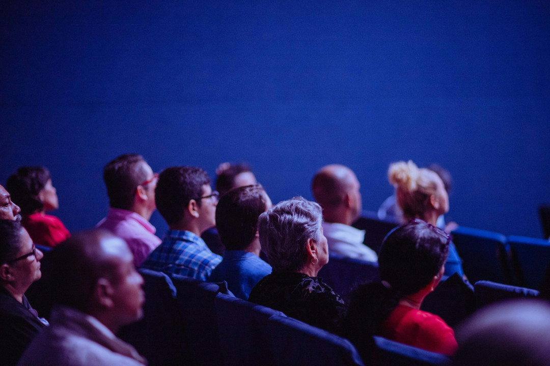 people-sitting-in-a-movie-theater-enjoying-a-film-image