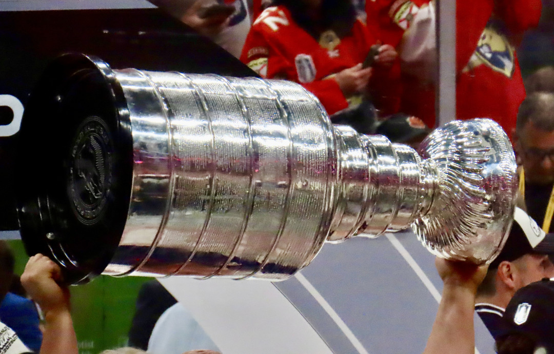 hands-holding-cup-hockey-column