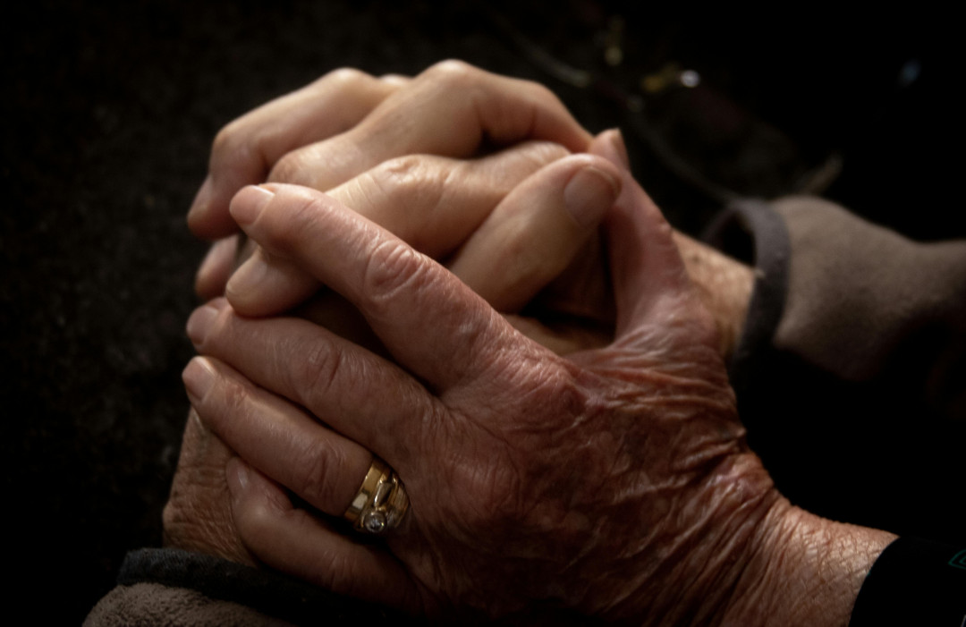 elderly-and-younger-hands-holding-each-other-symbolizing-care-connection-image