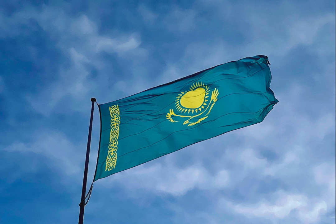 kazakhstan-flag-waving-against-blue-sky-image