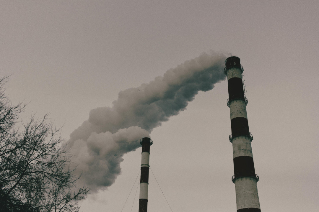 environmental-impact-recorded-by-smokestacks-emitting-plumes-of-smoke-into-the-sky-image