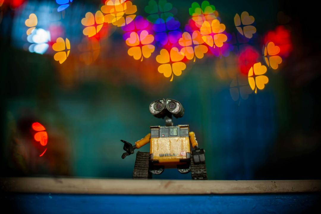 wall-e-robot-standing-in-field-film-scene-image