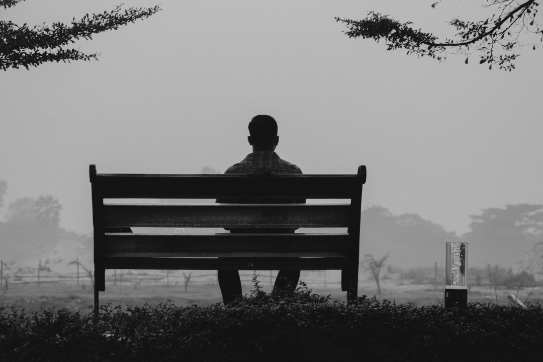 lonely-man-sitting-on-bench-image