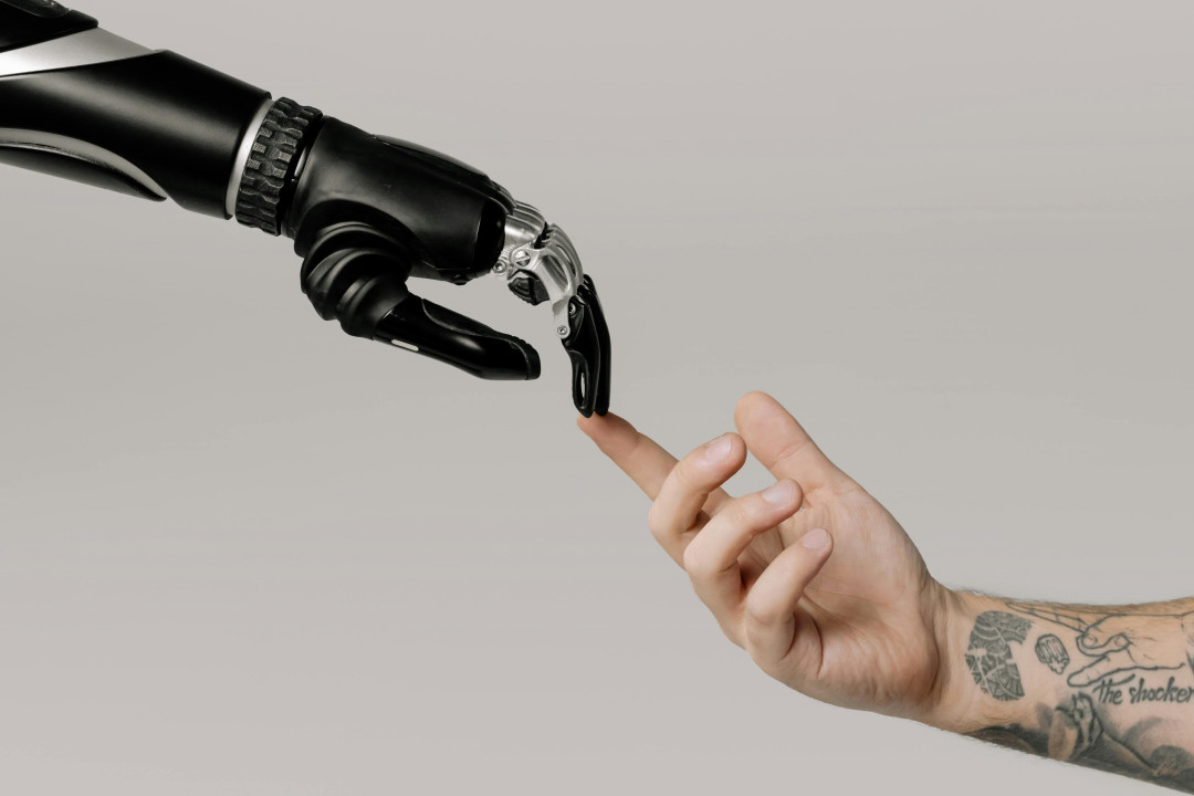 robot-hand-touching-human-fingertip-image