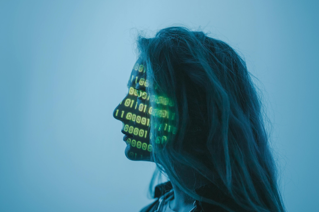 woman-with-symbols-of-light-reflecting-on-face-image